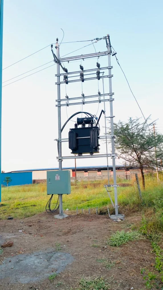 Compact substation next to industrial warehouse layout